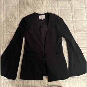 Women’s blazer. Bell sleeves. Beautiful. Non wrinkle.  Black. Size M